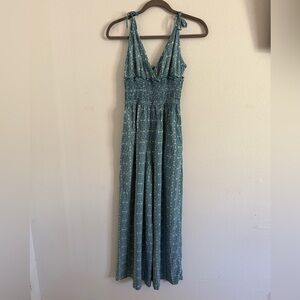 Elegant Blue Sleeveless romper with a stretchy waistband and tie-able straps